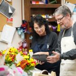 Florists looking at a tablet